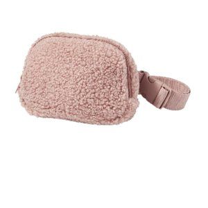 ULTA Beauty Pink Shearling Belt Bag in Dusty Rose